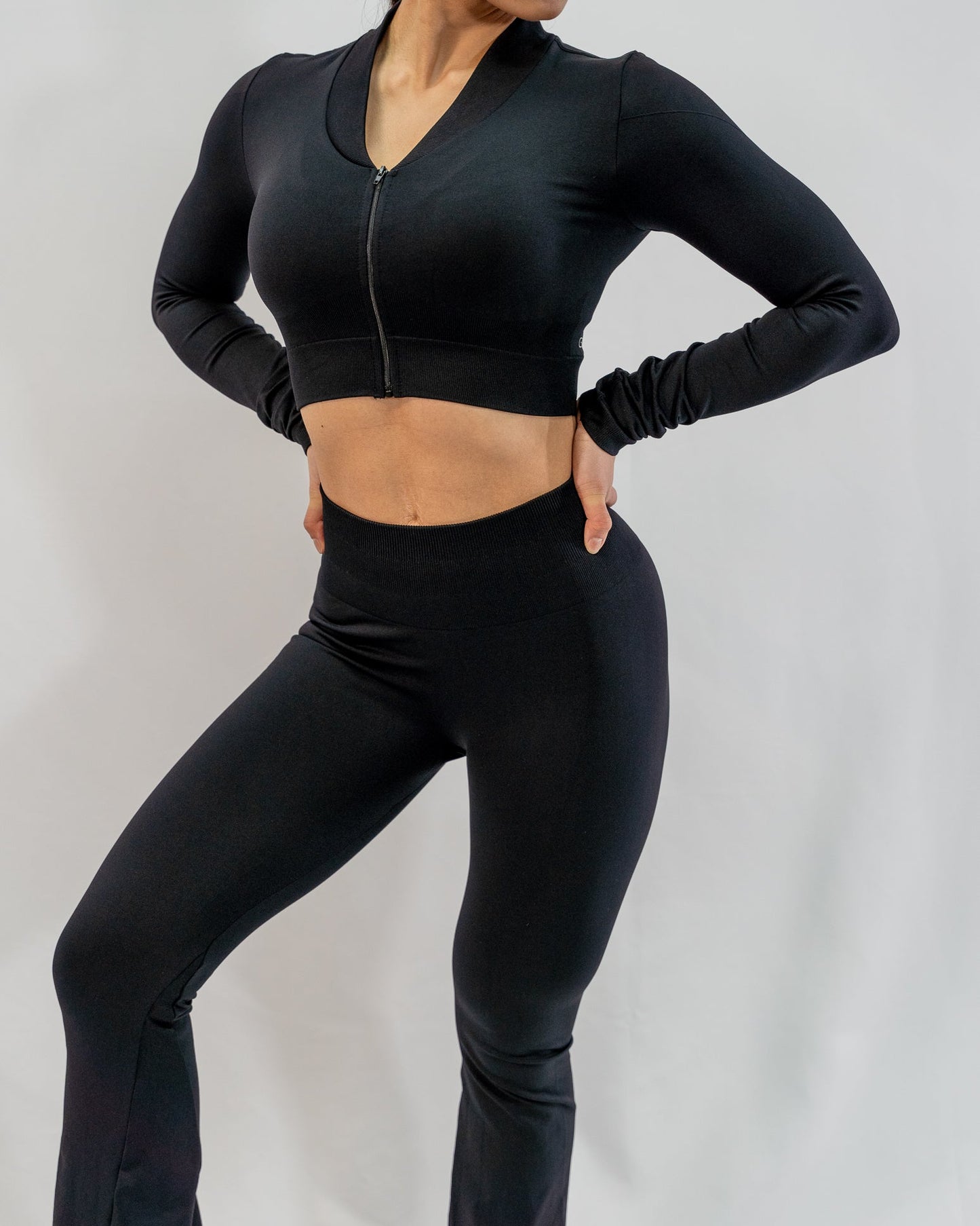 Glo Cropped Zipped Jacket in Black - Inner Glö Apparel