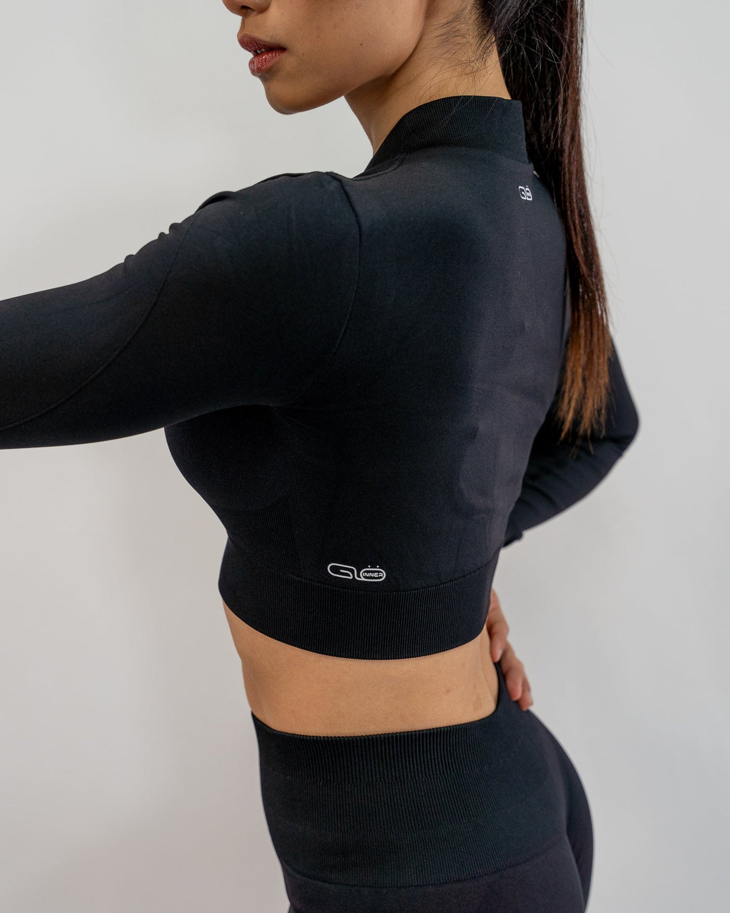 Glo Cropped Zipped Jacket in Black - Inner Glö Apparel