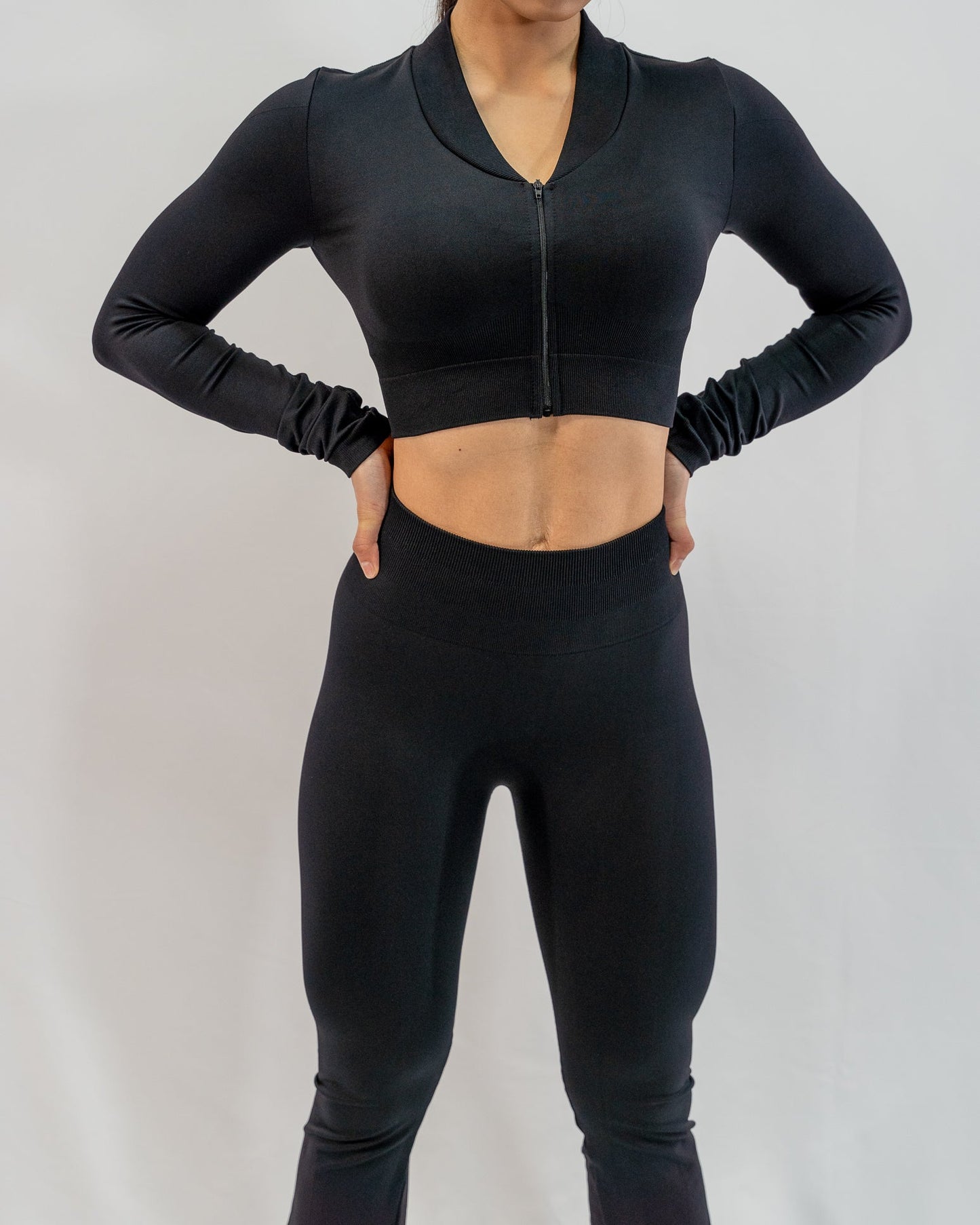 Glo Cropped Zipped Jacket in Black - Inner Glö Apparel