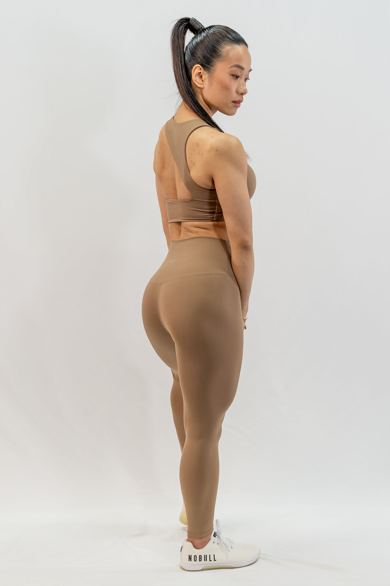 Dynamic Asymmetric Cut Sports Bra in Toffee - Inner Glö Apparel