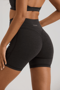 Bliss Cross Invisible Scrunch Shorts with Pockets in Black - Inner Glö Apparel