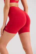 Bliss Cross Invisible Scrunch Shorts with Pockets in Ruby Red - Inner Glö Apparel